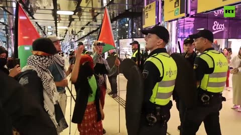 Police clash with pro-Palestine protesters in Amsterdam Central Station