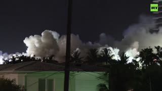 Florida condo building brought down in controlled explosion