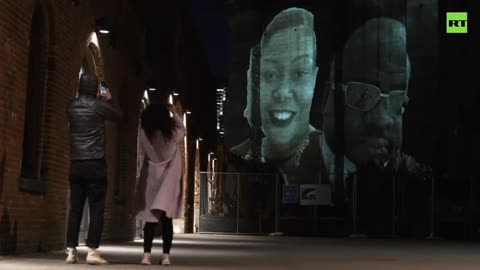 NYC marks anniversary of first COVID death, projecting virus victims’ portraits onto Brooklyn Bridge