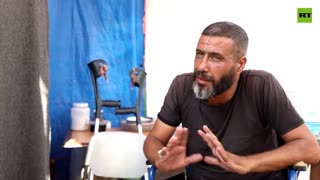 Story of Muawiya Al-Waheedi, Gazan barber who lost the ability to walk, work, and support his family