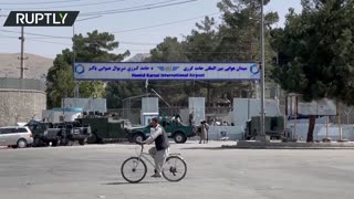Taliban members block roads to Kabul airport