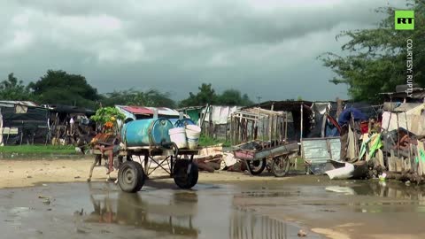 Thousands live in shacks at former airport runway in Colombia