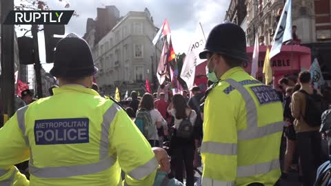 Crowd of XR protesters shuts down London junction