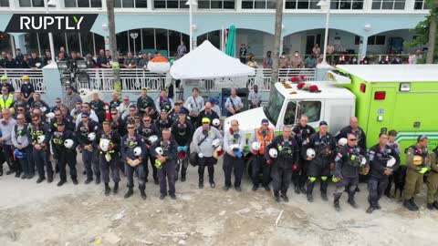 Moment of silence | Miami search & rescue operators halt mission at collapsed condo site