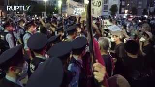 Anti-Olympic protesters clash with Tokyo police