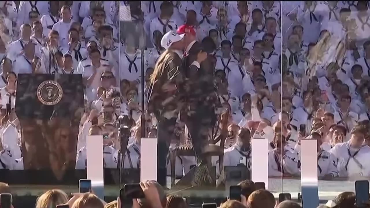 Trump arrives for his Titans of the Sea speech.