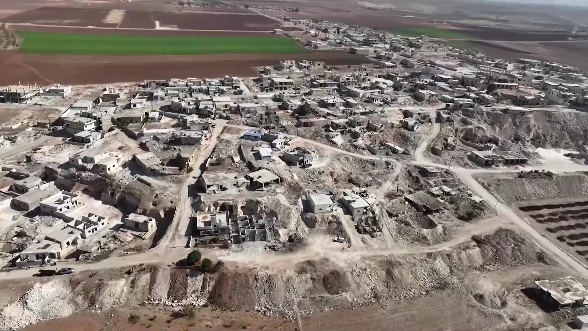 Syrians near Hama resettle in caves, lacking money to rebuild