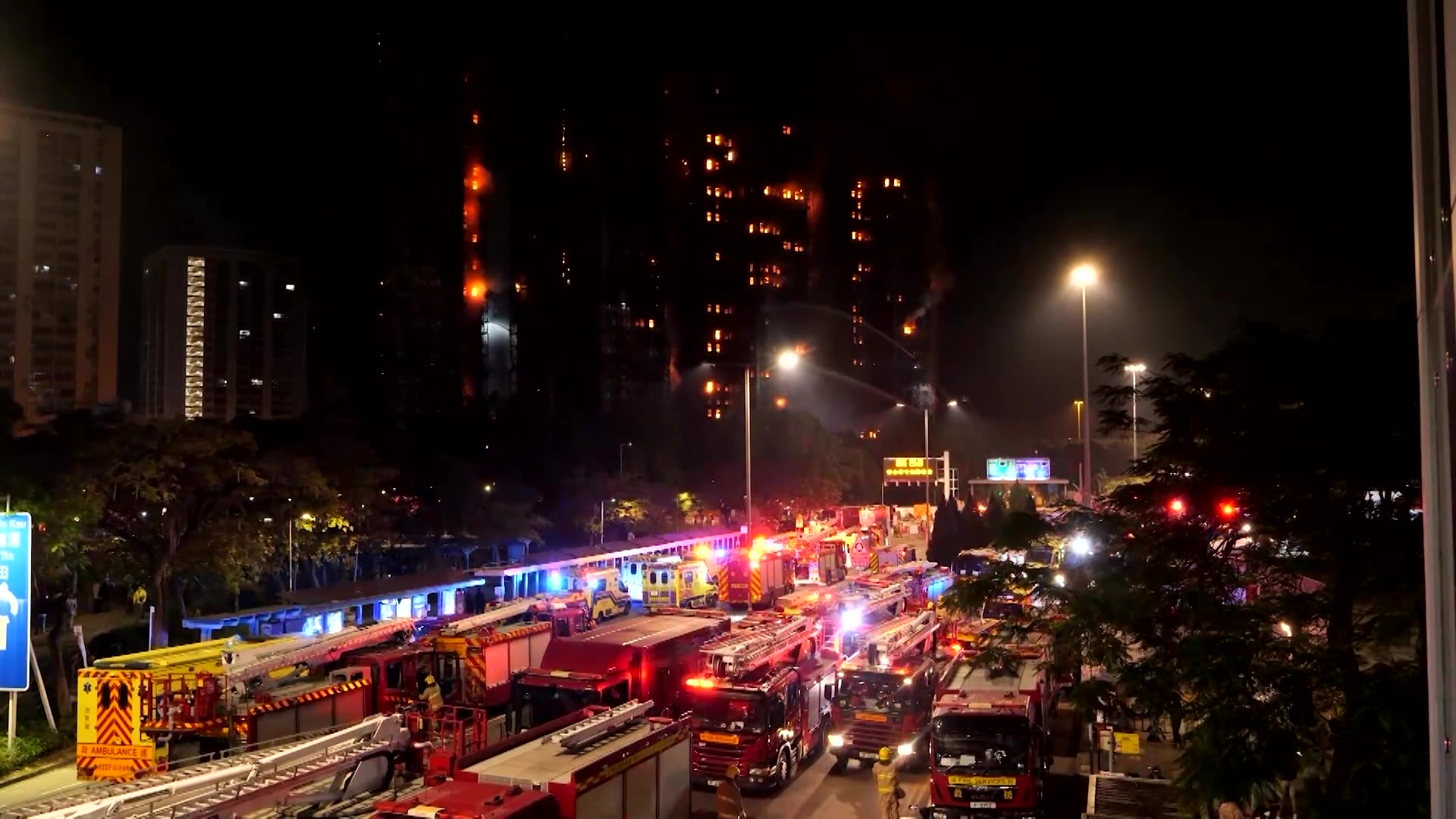 Hong Kong resident watches his home burn after leaving dog behind