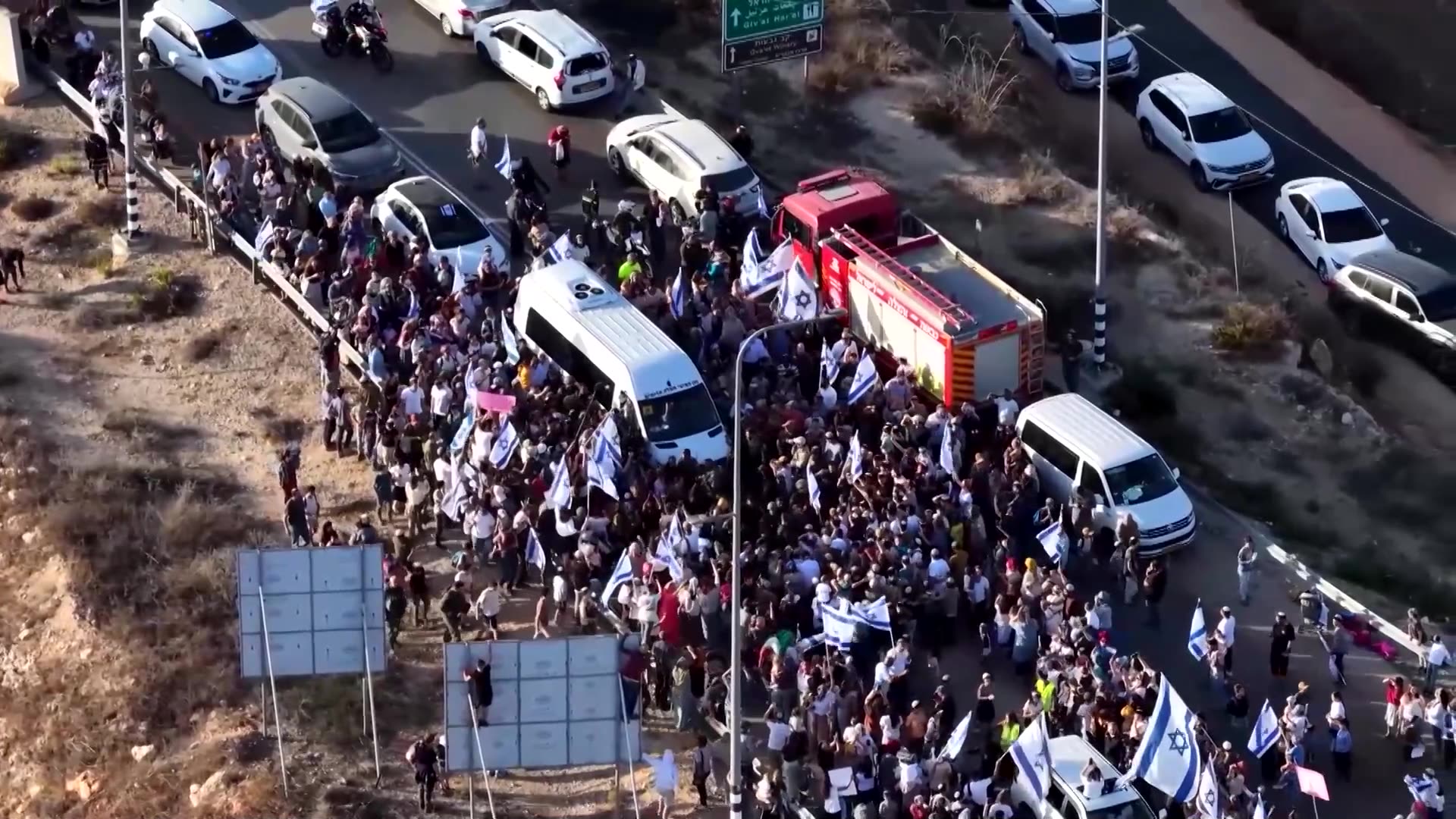 Freed hostage greeted by cheering crowd on return home to West Bank
