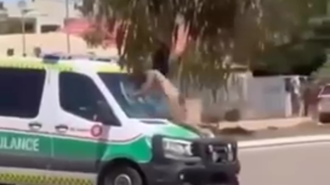 maniac smashes ambulance windscreen with his head in Kalgoorlie, Western Australia.