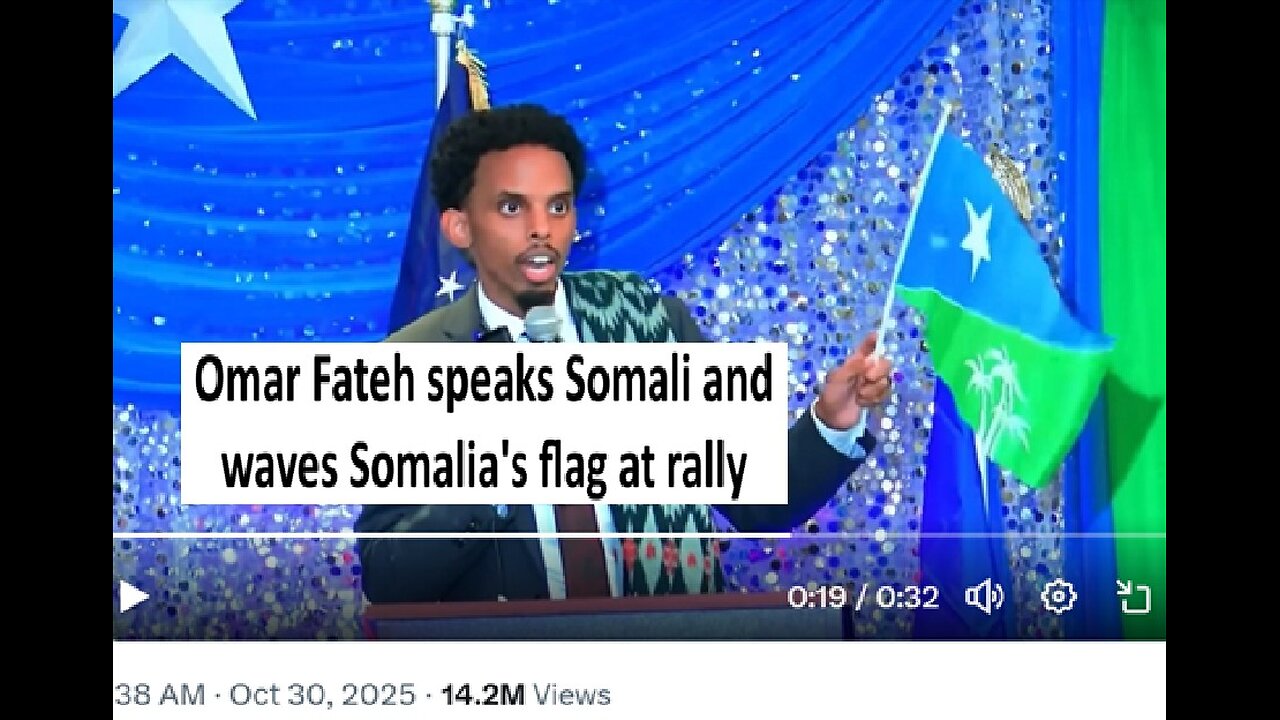 Omar Fateh waves Somalias flag and speaks somalin at rally to become may or Minneapolis