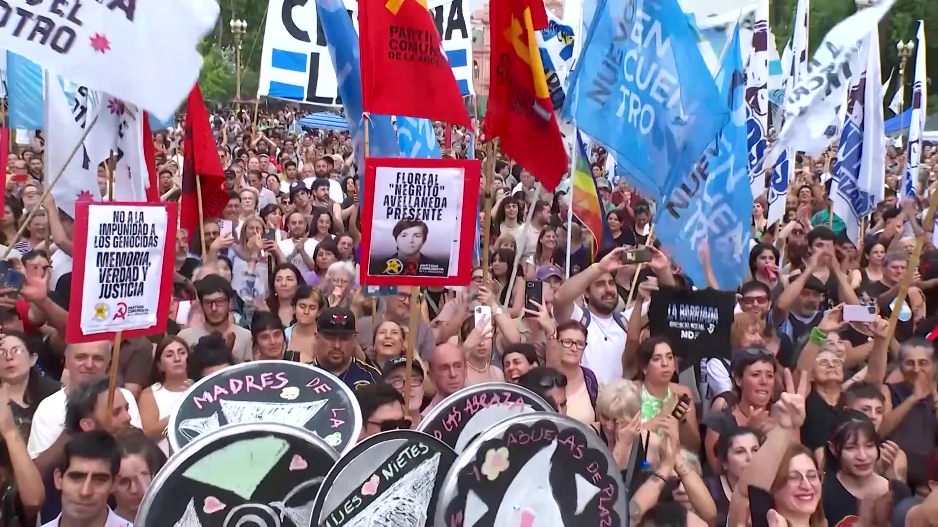 Argentines protest Mileis policies and mark human rights day