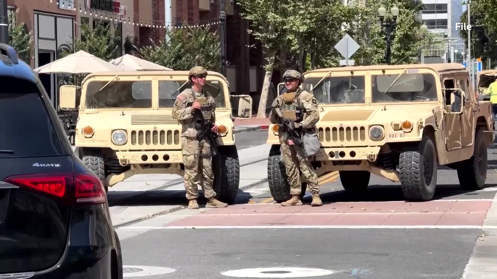 Trump again threatens Insurrection Act as troops arrive to Chicago