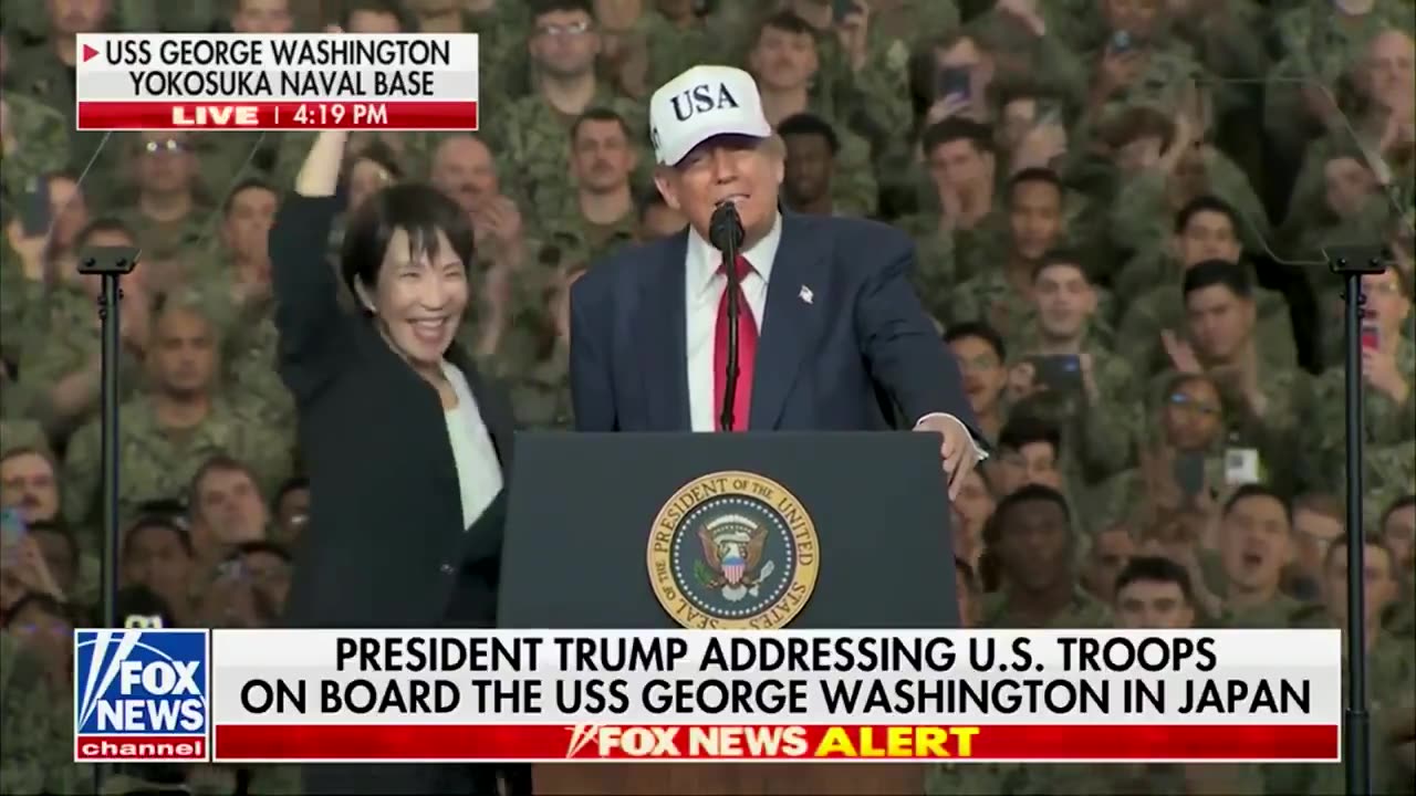 POTUS welcomes Japanese Prime Minister Takaichi on stage aboard USS George Washington.
