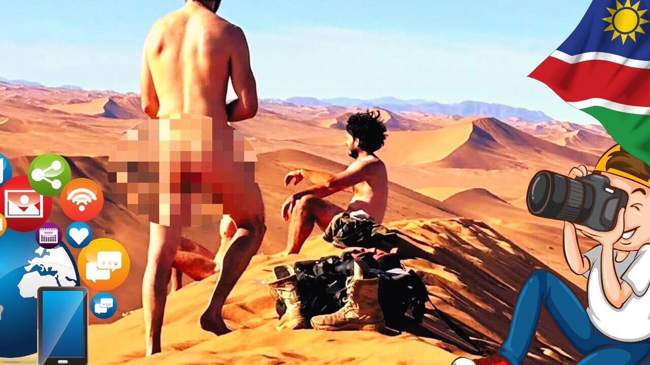 Touristes NUS pour une mode sociale sur la dune la plus spectaculaire du monde