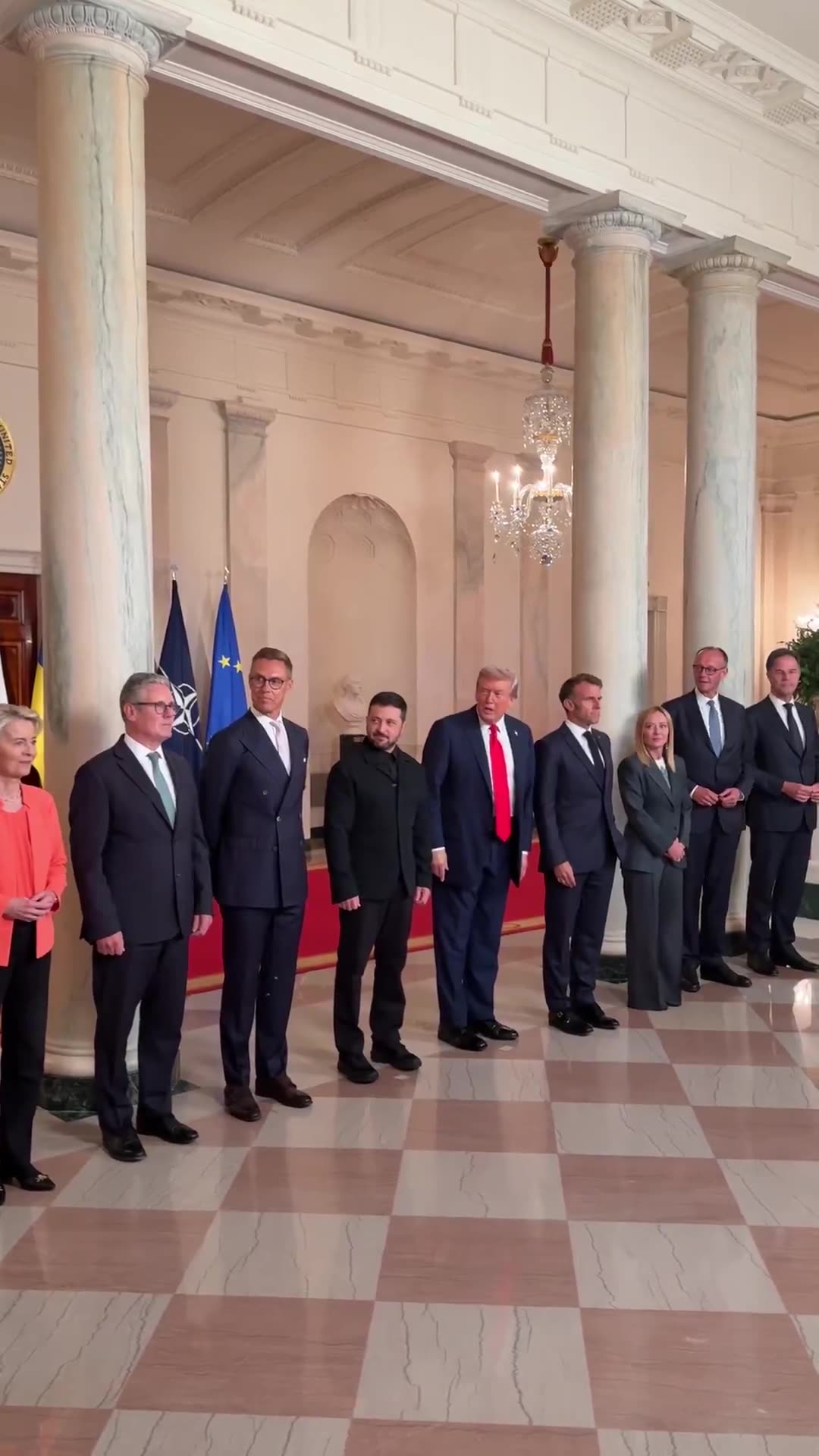 US President Donald J. Trump shows European leaders his Butler painting Fight, Fight, Fight