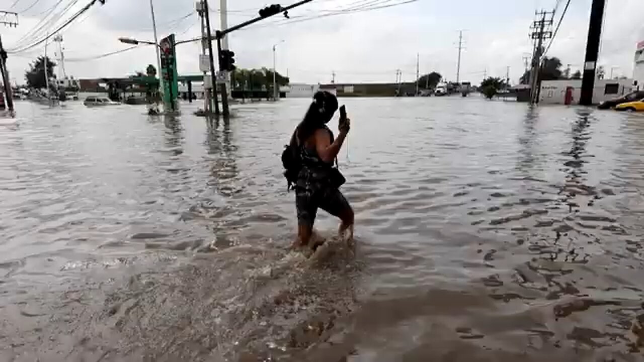 Heavy rains flood neighborhood in Central Mexico