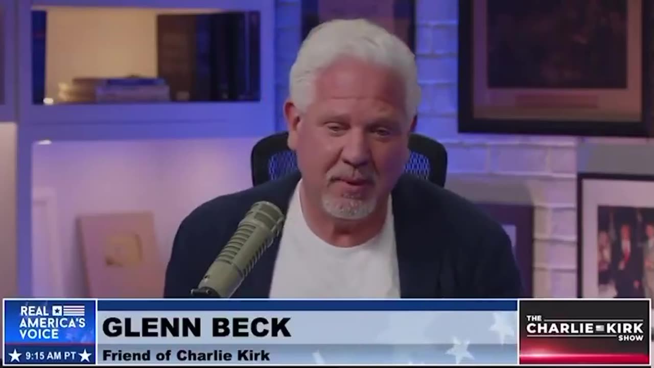 Glenn Beck places Rush Limbaughs golden microphone in front of Charlie Kirks chair