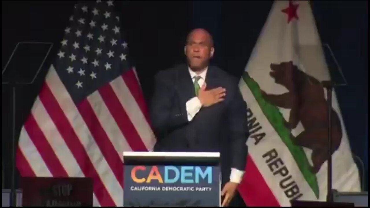 Cory Booker gives a salute to the California Democratic Party Convention
