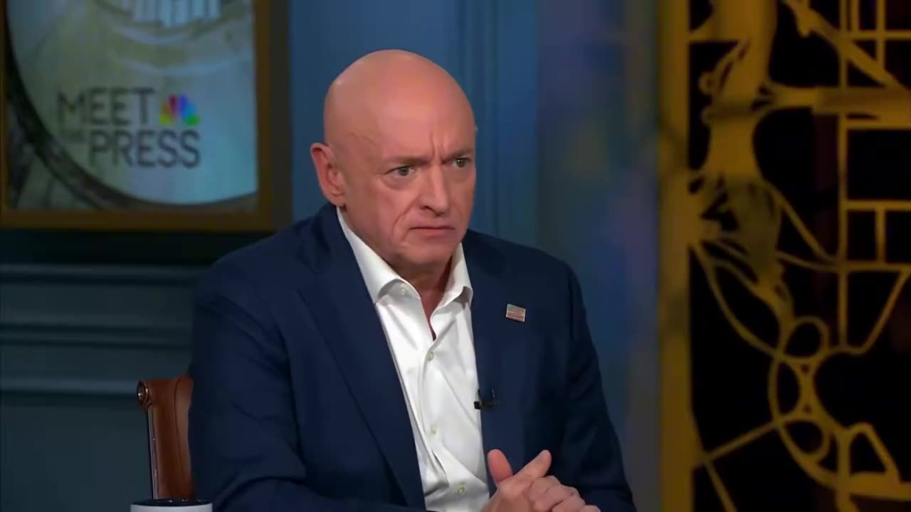 Mark Kelly claims Trumps pause on third world immigration is racist
