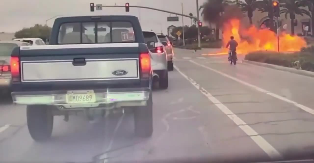 No helmet. No safety gear. Just barreling into an upcoming intersection at full speed.