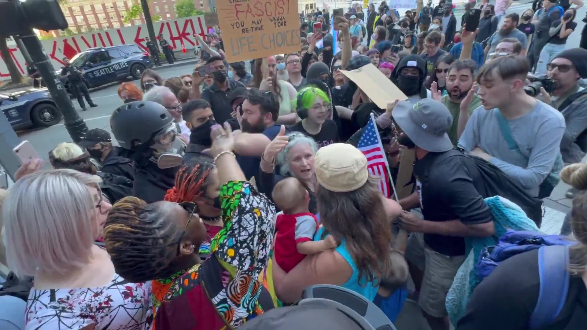 LGBTQ+ Mob Surrounds a Mom With Her Baby to Block Her From Attending a Christian Rally in Seattle