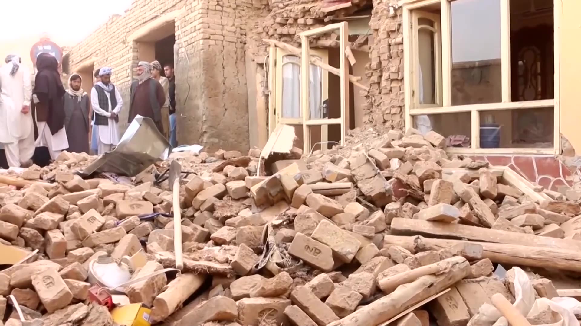 Afghans dig through rubble after deadly quake strikes countrys north