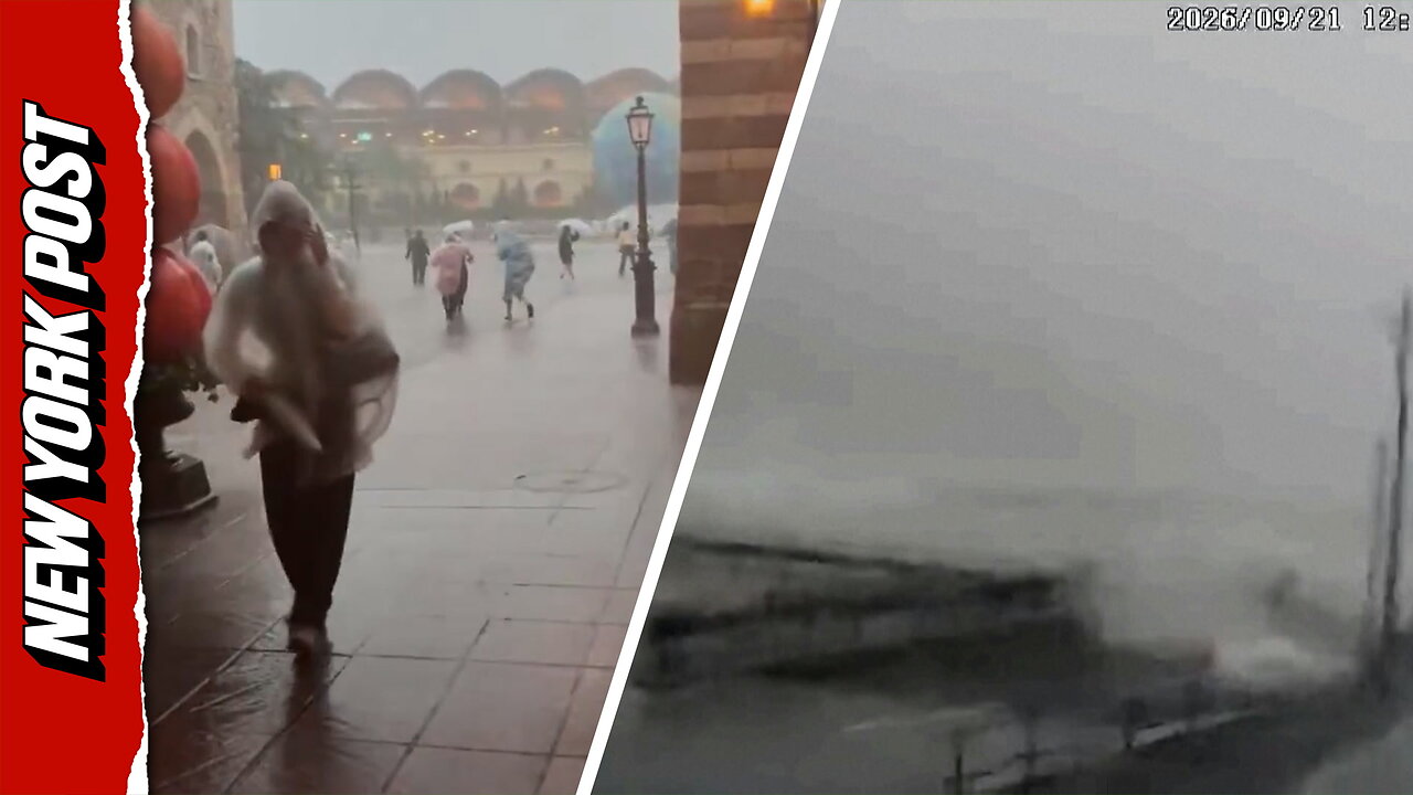 Typhoon Dujuan wallops eastern Japan as residents trudge through floodwaters to safety thumbnail
