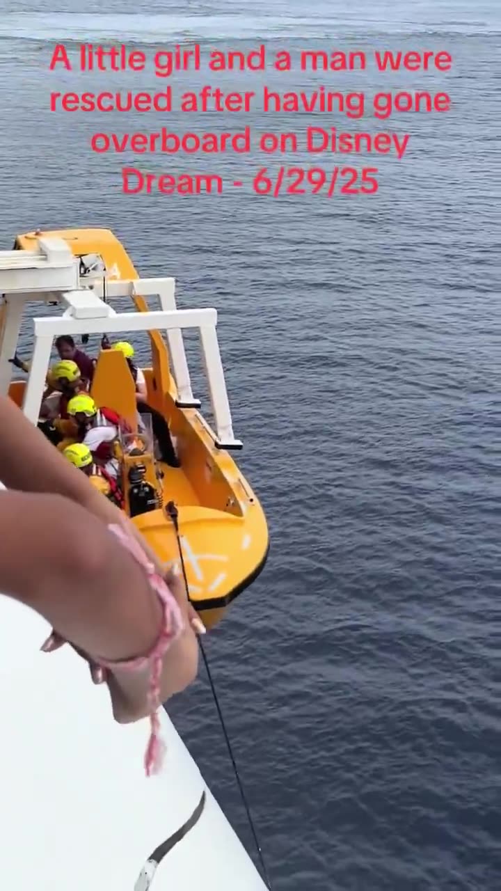 NEW: Father jumps overboard to save his 5-year-old daughter, who fell off a Disney
