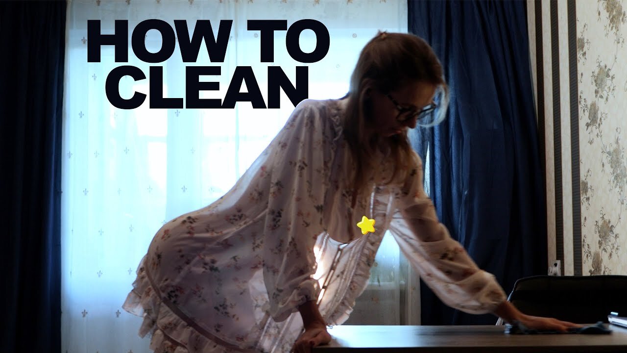 Transparent desk Cleaning with girlfriend in a dress