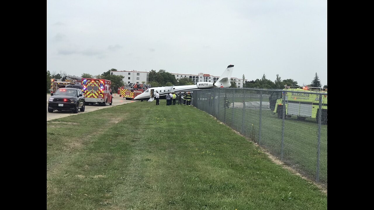 Jet crashes through fence at Chicago Executive Airport