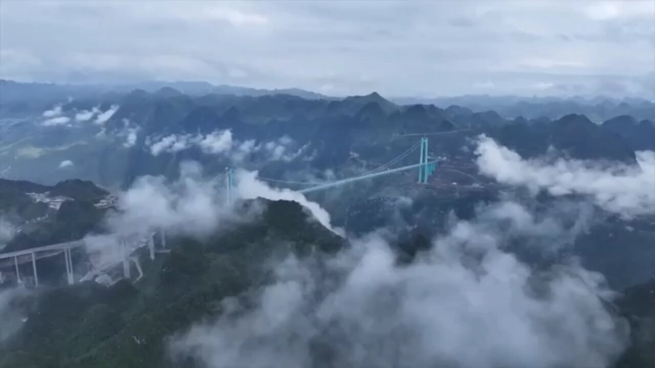 Worlds tallest bridge completes load test in China