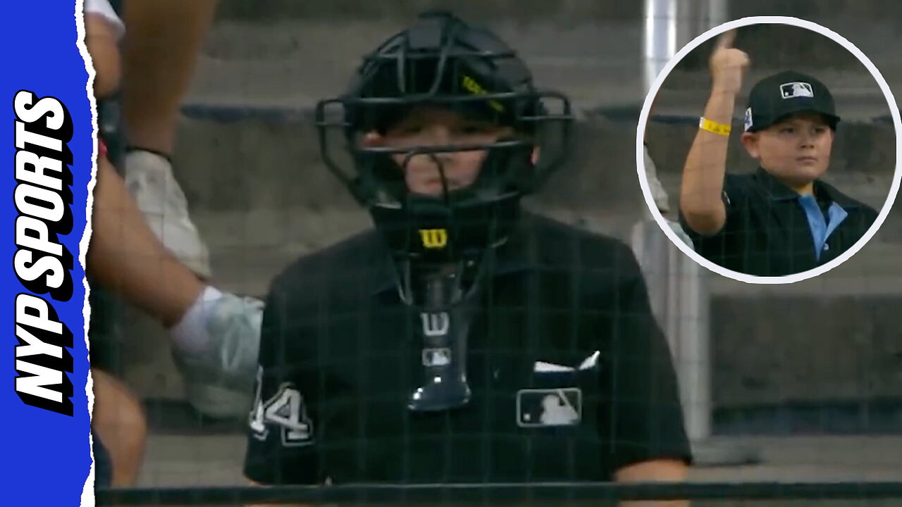 Young baseball fan attends Cubs-Cardinals series…in FULL UMPIRE GEAR!
