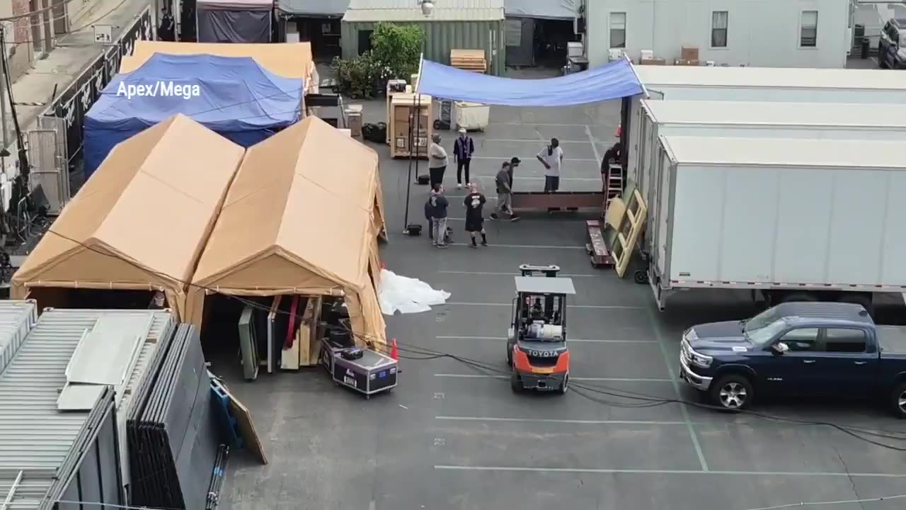 Movers clearing out the studio of Jimmy Kimmel Live as CNN reports ABC will bring him back if he