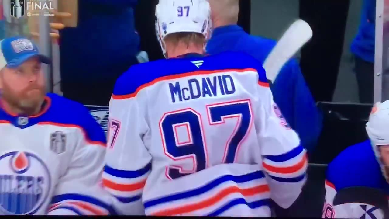 Oilers Connor McDavid leaves the ice for a short time after this hit