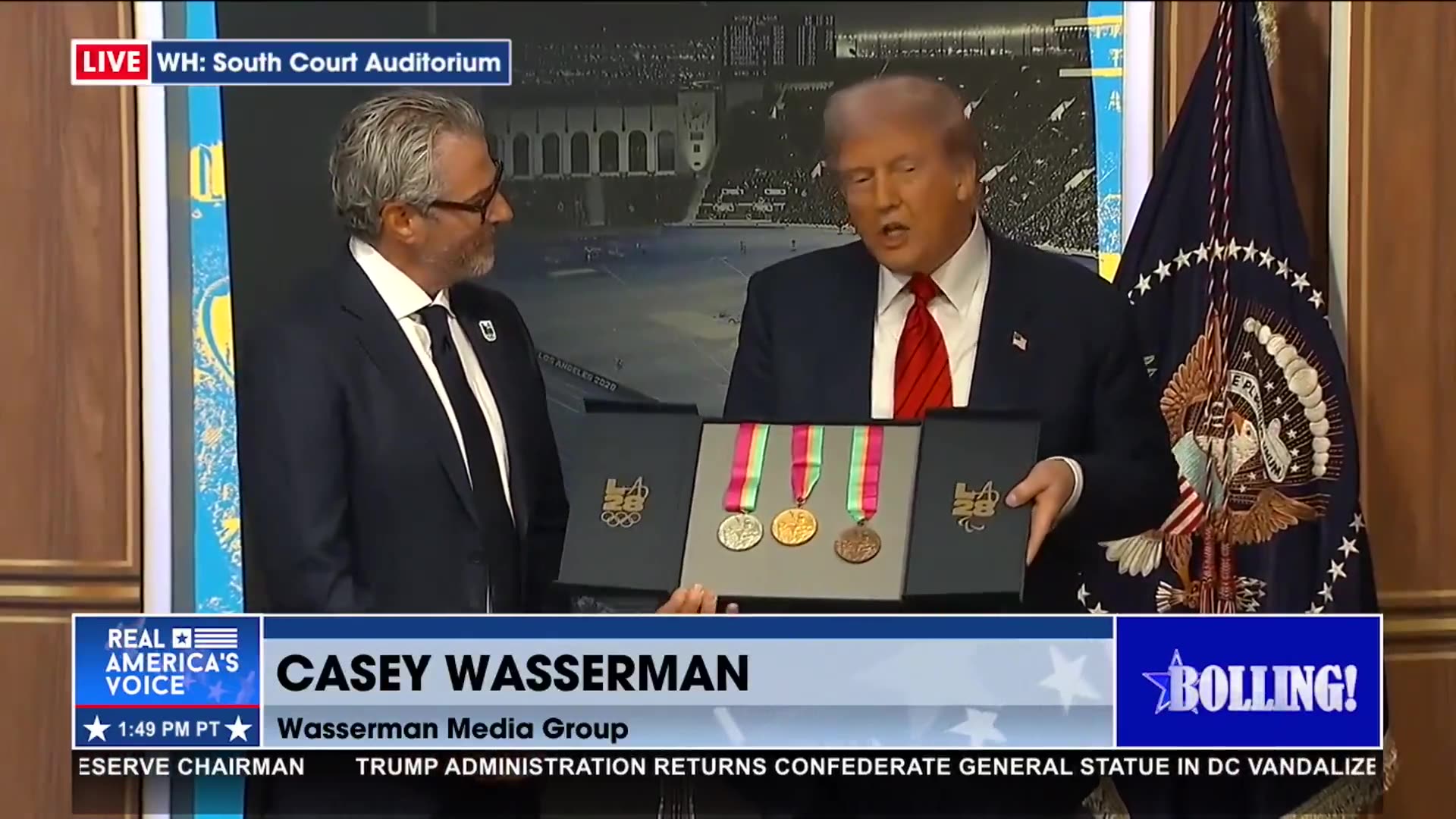 CHAIRMAN OF 2028 LA OLYMPICS PRESENTS TRUMP WITH A SET OF MEDALS FROM 1984 OLYMPICS