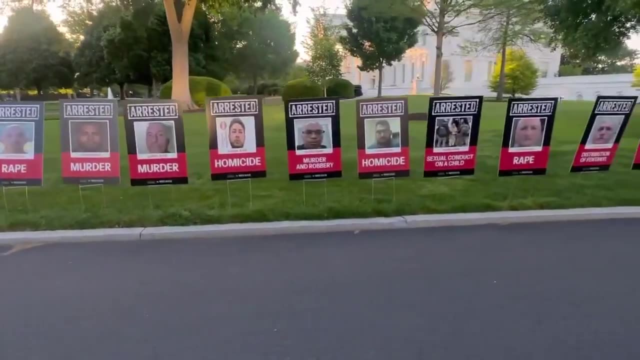 White House lawn lined with the faces of people arrested for sex and drug-related violent crimes