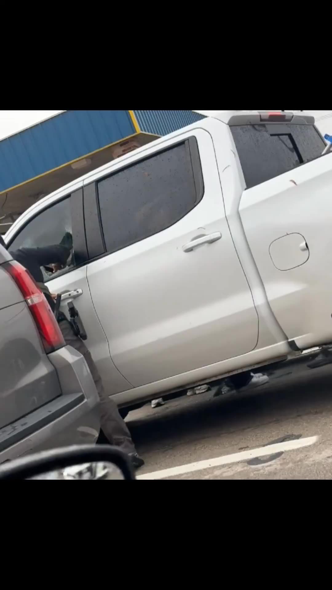 DHS agent breaks the window of a truck when the illegal alien driver refuses to comply