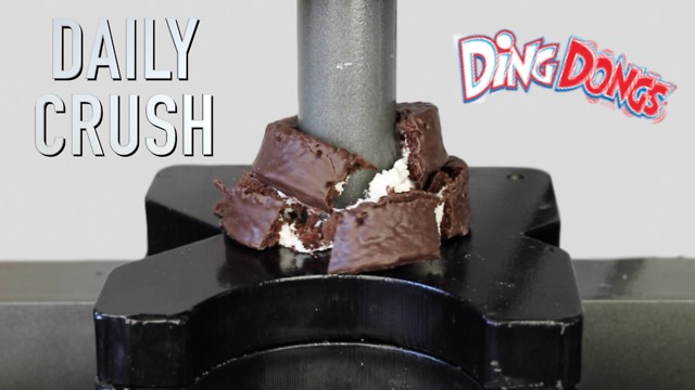 Crushing a cupcake with hydraulic press