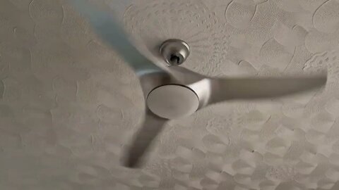 2 minutes of calm relaxation watching a cooling ceiling fan with a clock ticking