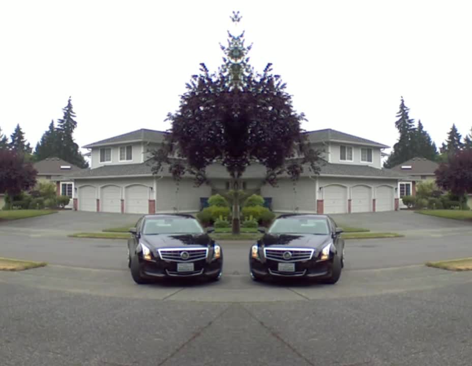 Two Black Cadillacs collide. Fun video. Short video.